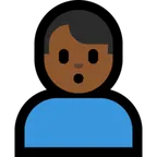 man pouting: medium-dark skin tone til Microsoft platform