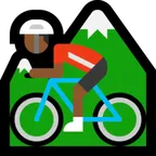 person mountain biking: medium-dark skin tone สำหรับแพลตฟอร์ม Microsoft