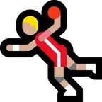 man playing handball: medium-light skin tone pentru platforma Microsoft