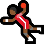 man playing handball: medium-dark skin tone for Microsoft platform