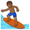 man surfing: medium-dark skin tone for Samsung platform