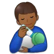 man feeding baby: medium-dark skin tone สำหรับแพลตฟอร์ม Samsung
