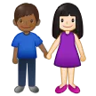 woman and man holding hands: light skin tone, medium-dark skin tone para a plataforma Samsung