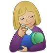 woman feeding baby: medium-light skin tone สำหรับแพลตฟอร์ม Samsung