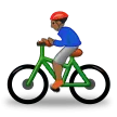 man biking: medium-dark skin tone for Samsung platform