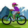 woman mountain biking: medium-dark skin tone لمنصة Samsung