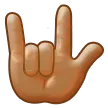 love-you gesture: medium skin tone alustalla Samsung