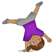 woman cartwheeling: medium skin tone untuk platform Samsung