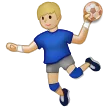 man playing handball: medium-light skin tone pentru platforma Samsung