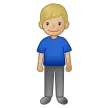man standing: medium-light skin tone voor Samsung platform