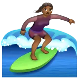 woman surfing: medium-dark skin tone สำหรับแพลตฟอร์ม Whatsapp