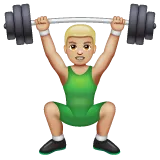 person lifting weights: medium-light skin tone สำหรับแพลตฟอร์ม Whatsapp