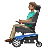 man in motorized wheelchair: medium skin tone alustalla Whatsapp