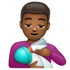 man feeding baby: medium-dark skin tone สำหรับแพลตฟอร์ม Whatsapp