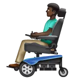 man in motorized wheelchair: dark skin tone สำหรับแพลตฟอร์ม Whatsapp