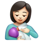 woman feeding baby: light skin tone لمنصة Whatsapp