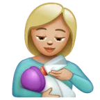 woman feeding baby: medium-light skin tone สำหรับแพลตฟอร์ม Whatsapp