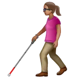 woman with white cane: medium skin tone för Whatsapp-plattform