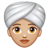woman wearing turban: medium-light skin tone for Whatsapp platform