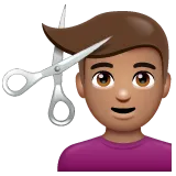 man getting haircut: medium skin tone لمنصة Whatsapp