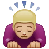 man bowing: medium-light skin tone for Whatsapp platform