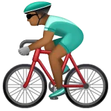 man biking: medium-dark skin tone for Whatsapp platform