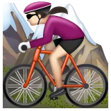 woman mountain biking: light skin tone til Whatsapp platform