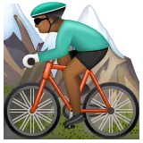 man mountain biking: medium-dark skin tone สำหรับแพลตฟอร์ม Whatsapp