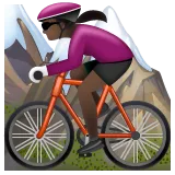 woman mountain biking: dark skin tone لمنصة Whatsapp
