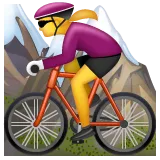 woman mountain biking for Whatsapp-plattformen