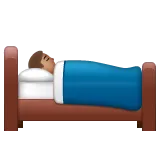 person in bed: medium skin tone لمنصة Whatsapp