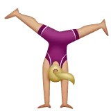 woman cartwheeling: medium-light skin tone for Whatsapp platform