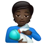 person feeding baby: dark skin tone สำหรับแพลตฟอร์ม Whatsapp