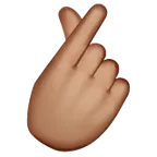 hand with index finger and thumb crossed: medium skin tone pentru platforma Whatsapp