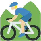 man mountain biking: medium-light skin tone for X / Twitter platform